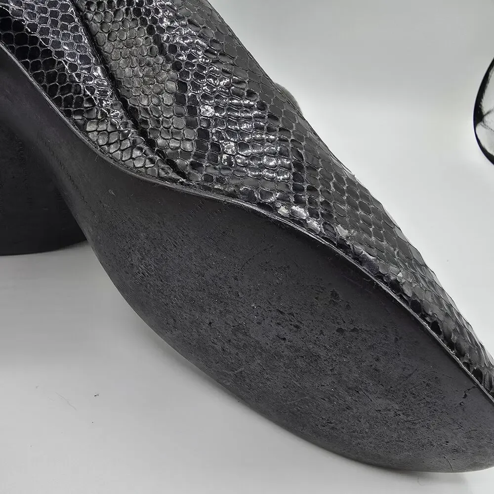 Stuart Weitzman black patent snake print low heel close toe wedges